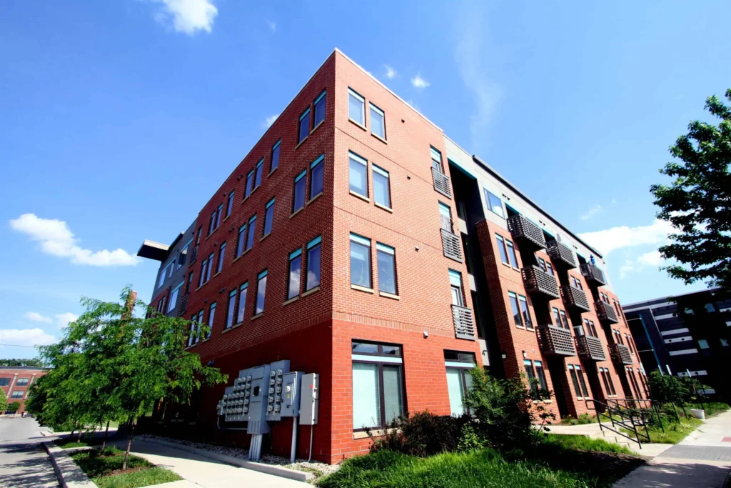 Red brick repair on a multi-story building, showcasing top-rated brick repair and tuckpointing in Indianapolis.