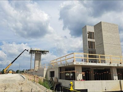 Commercial masonry construction by Emerson Masonry in Indianapolis, showing concrete block elevator shafts and a lift.