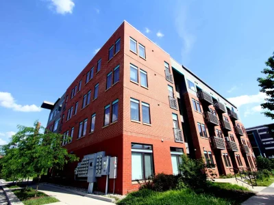 Red brick repair on a multi-story building, showcasing top-rated brick repair and tuckpointing in Indianapolis.